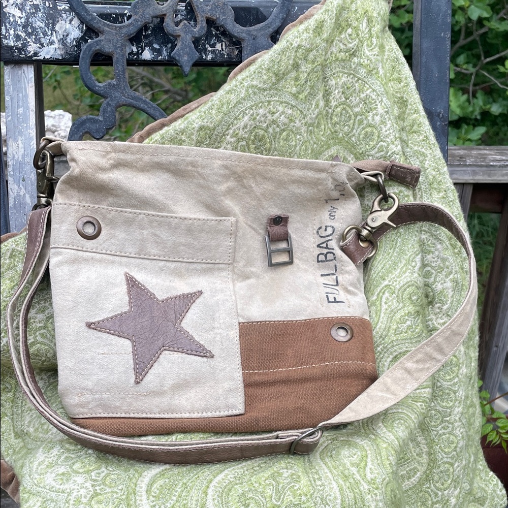 Myra upcycled canvas and leather crossbody bag.